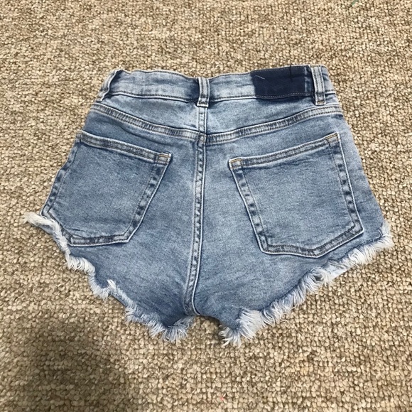 Ripped light blue jean shorts distressed ends - Picture 2 of 2